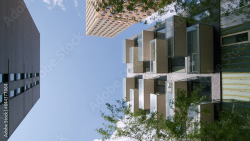 Modern Buildings Against Sunny Blue Sky In Zuidas, Business District In Amsterdam, Netherlands. low angle photo