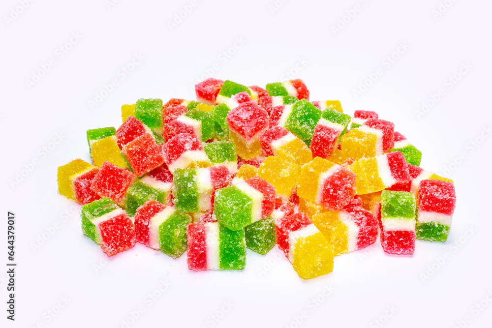 colorful marmalade cubes in sugar on white background colorful marmalade cubes in sugar on white background
