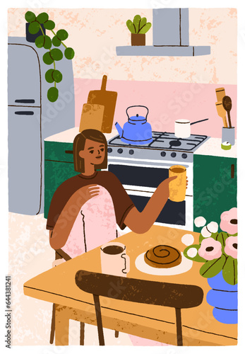 Girl sitting at table with tea mug and roll in cozy kitchen. Young black woma...