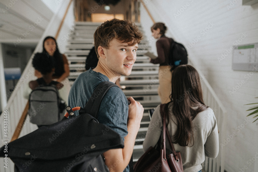 custom made wallpaper toronto digitalPortrait of smiling male student with friends at university