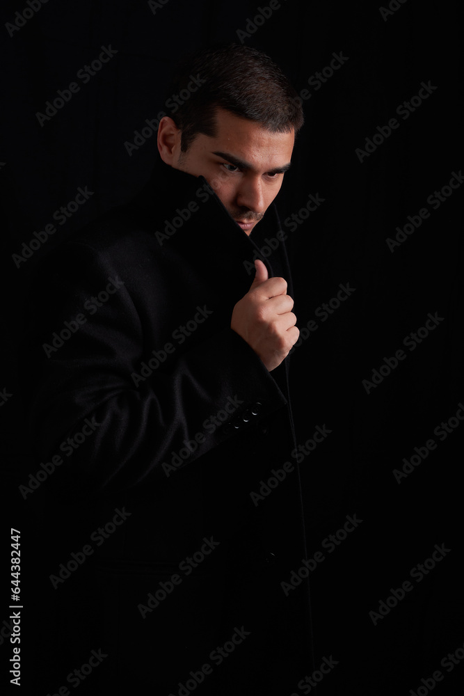 Mysterious man on black background Mysterious man on black background