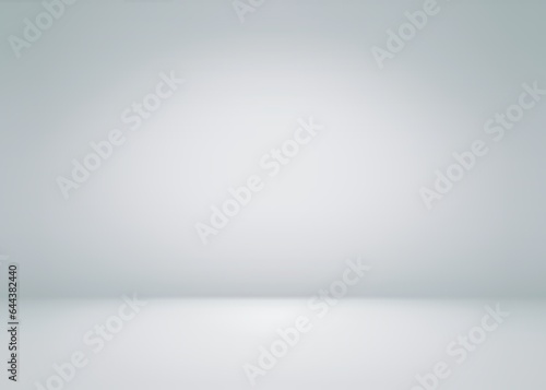 Gray empty room 3d background. Diffused spotlight on wall and floor.
