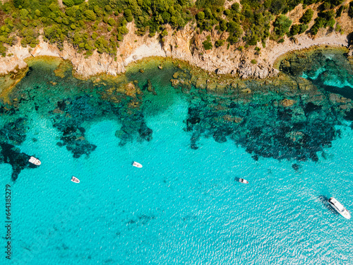 Fototapeta Naklejka Na Ścianę i Meble -  Luxury beach with perfectly clear water on the island of Sardinia in Italy. Tourist destination in Europe
