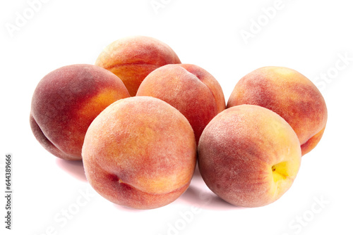  Ripe juicy peaches on white background.