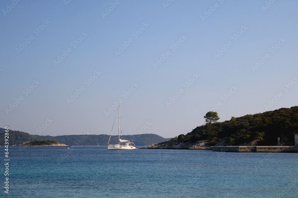 Sailing boat and beautiful Adriatic sea landscape in Croatia.