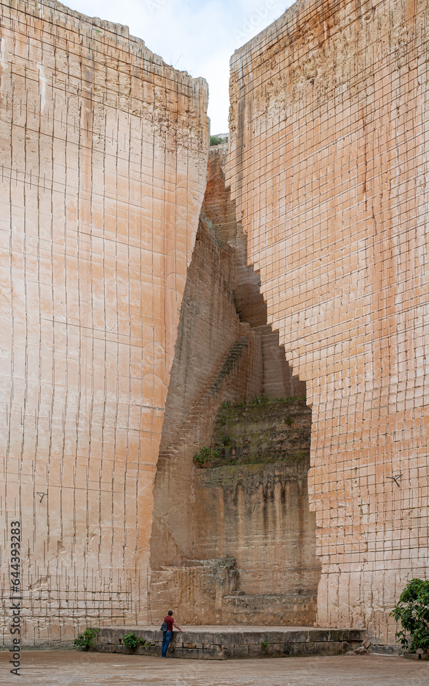 ladder to the bottom of a deep impressive sandstone quarry Stock Photo Adobe Stock