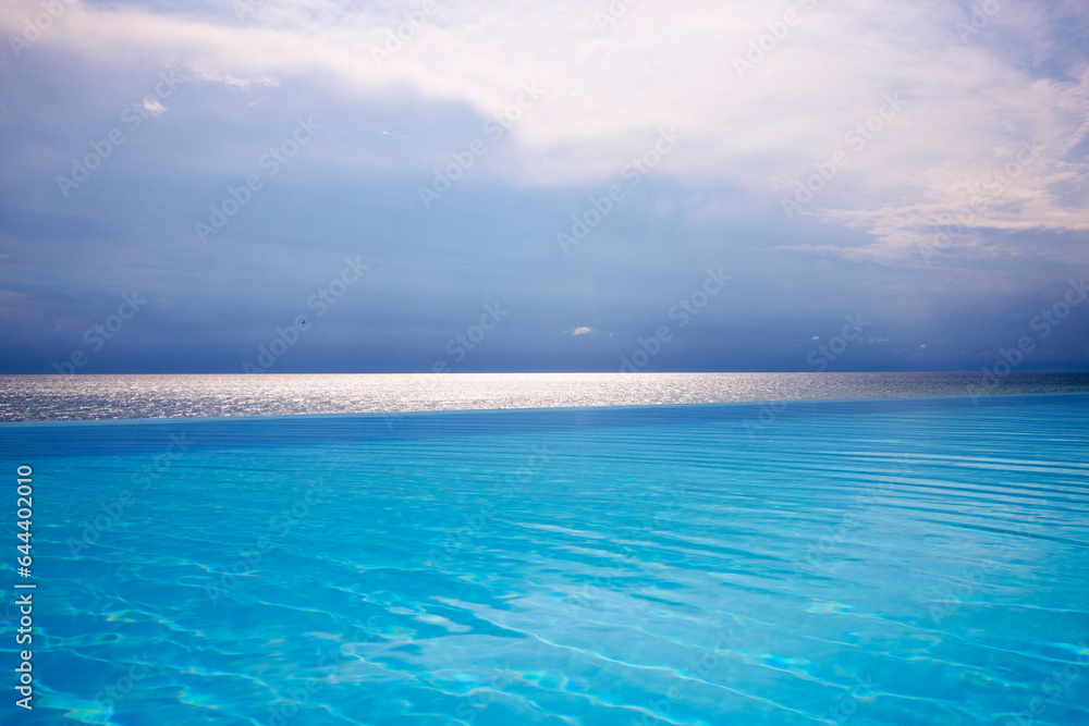Beautiful landscape with an infinity pool by the sea. Beautiful landscape with an infinity pool by the sea.