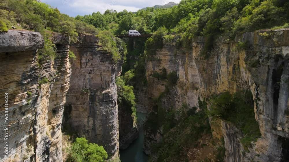 Albania Canyon Osum. Beautiful trees and river in-between of huge mountains with a lot of greenery around. Albania Canyon Osum. Beautiful trees and river in-between of huge mountains with a lot of greenery around.