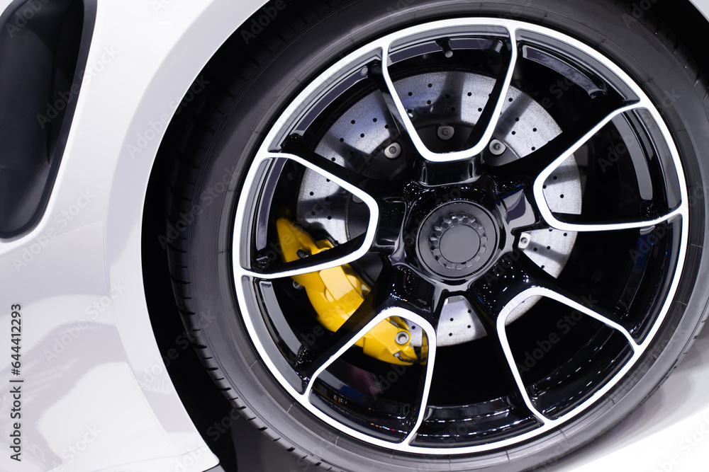 Details on white super sports car wheels, modern luxury car
