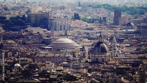 Panoramic aerial shot of iconic temple of Pantheon built in 118 to 125 A.D. with a dome and renaissance tombs and Sant'Agnese in Agone church on Navona square in Rome historic centre, Italy photo