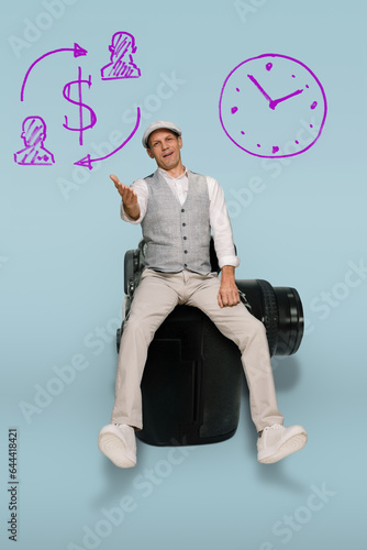 Young photographer with financial ideas planining to increase business growth, on a light blue background photo