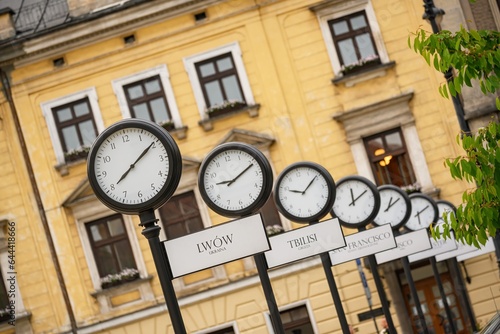 Clocks showing the current time in cities around the world. Krakow, Poland
