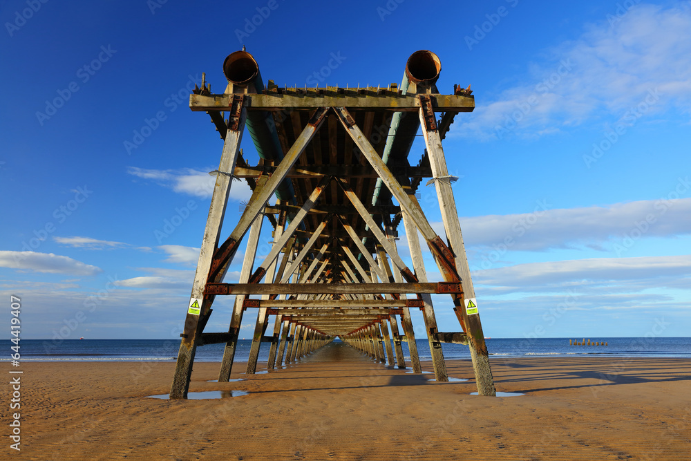 Abstrct view of a wooden pier at Hartlepool, County Durham, England, UK.