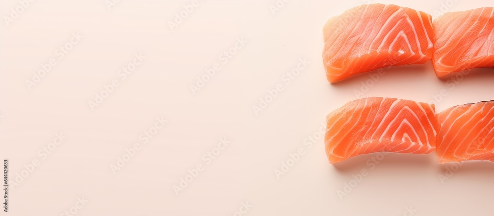 salmon used in sushi isolated pastel background Copy space salmon used in sushi isolated pastel background Copy space