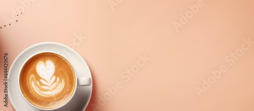 Steaming latte on isolated table isolated pastel background Copy space