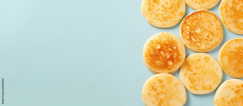 Stack of cheese pancakes on a isolated pastel background Copy space separate Stack of cheese pancakes on a isolated pastel background Copy space separate