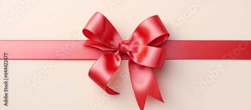 Solitary isolated pastel background Copy space with red ribbon bow