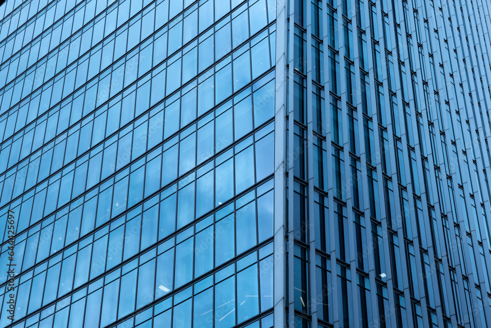 Modern abstract reflections in glass fronted commercial office buildings in the financial district of the British capital London. Modern abstract reflections in glass fronted commercial office buildings in the financial district of the British capital London.