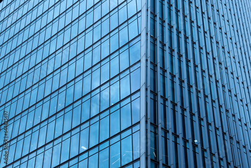 Modern abstract reflections in glass fronted commercial office buildings in the financial district of the British capital London.