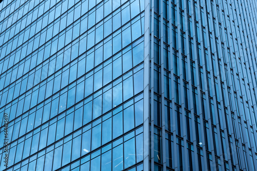 Modern abstract reflections in glass fronted commercial office buildings in the financial district of the British capital London.