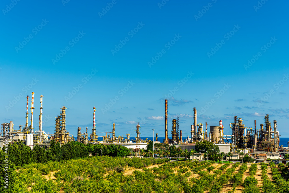 Fototapeta premium oil refinery facroty, recycle of oil and petroleum in green outdoor nature