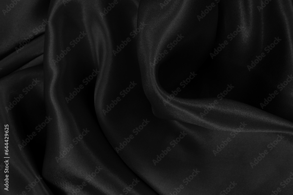 Black grey fabric texture background, detail of silk or linen pattern. Black grey fabric texture background, detail of silk or linen pattern.