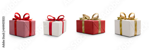 Obraz na płótnie A collection of red and white gift wrapped presents with a red and gold ribbon bows isolated against a transparent background. w salonie