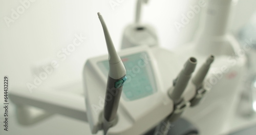 Tools and equipment for dental treatment in a dental clinic. Close-up of the dentist s workplace.