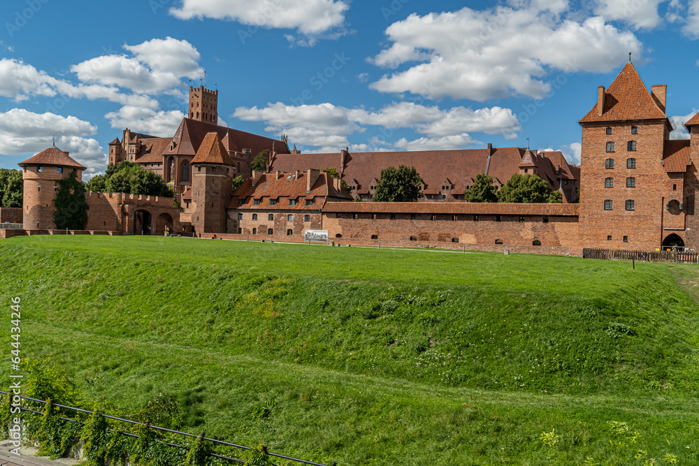 View of the Teutonic Castle in Malbork on a summer,sunny day. View of the Teutonic Castle in Malbork on a summer,sunny day.