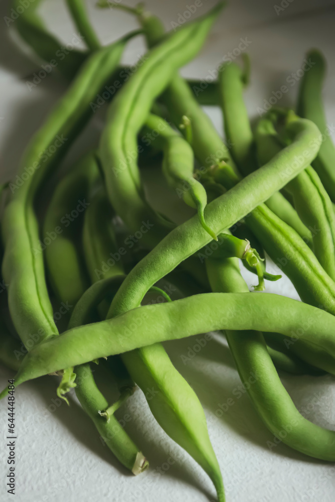 Bean asparagus close-up. a lot of asparagus, legumes. Healthy legumes in summer are green bean asparagus. Bean asparagus close-up. a lot of asparagus, legumes. Healthy legumes in summer are green bean asparagus.