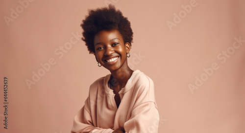 Smiling woman with Afro hair against a light beige background. Generative AI © iuricazac