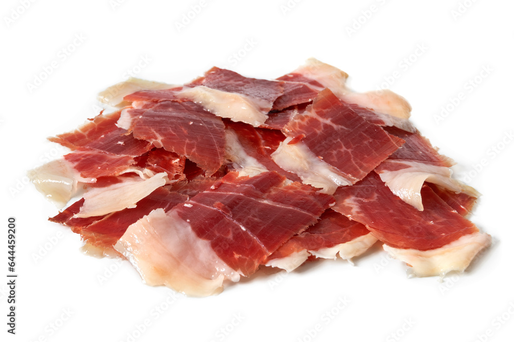 Sliced Iberian Serrano ham isolated on white background. Iberian serrano ham is a Spanish delicacy,famous for its smoky flavor and tender, salty texture, the richness of the Iberian culinary tradition Sliced Iberian Serrano ham isolated on white background. Iberian serrano ham is a Spanish delicacy,famous for its smoky flavor and tender, salty texture, the richness of the Iberian culinary tradition