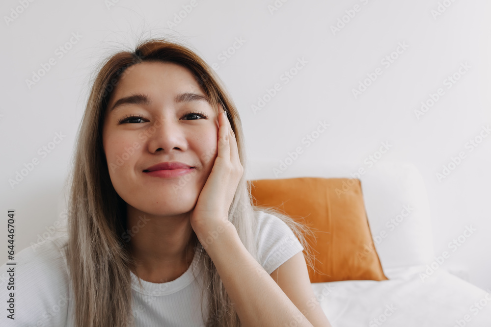 Asian women happy smiling look at the camera. Asian women happy smiling look at the camera.