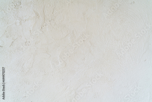 A picture of a bare plaster wall that is plastered with plain white plaster is part of the wall of the house, which is a popular color on the wall of the house or building wall. and commonly used as a photo