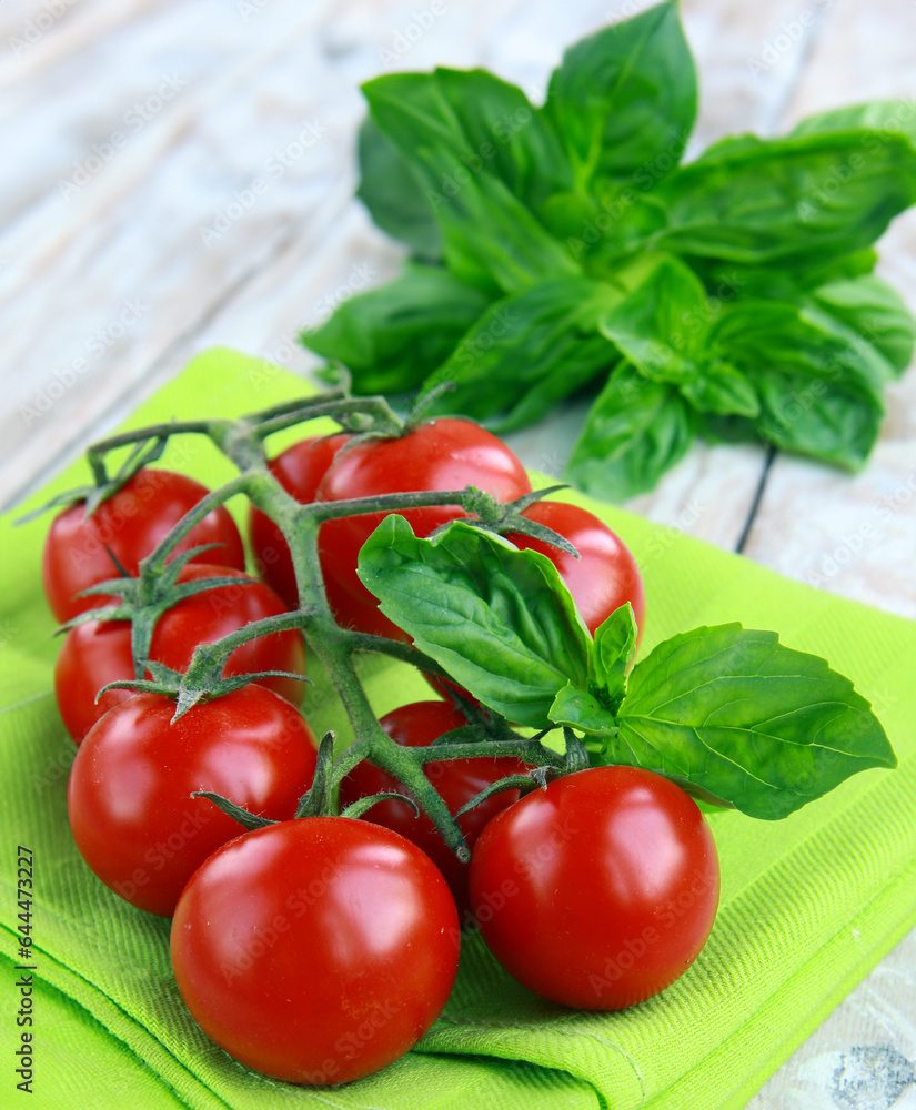 fresh organic tomatoes and basil on wooden background fresh organic tomatoes and basil on wooden background