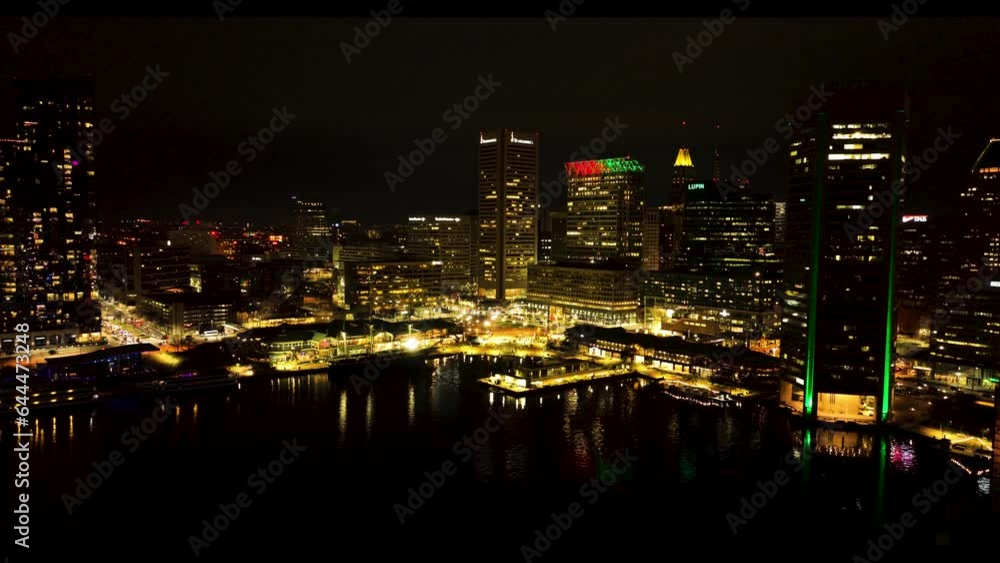 Baltimore, USA - 31 July 2023: Aerial view of Baltimore downtown at night, Maryland, United States. Baltimore, USA - 31 July 2023: Aerial view of Baltimore downtown at night, Maryland, United States.