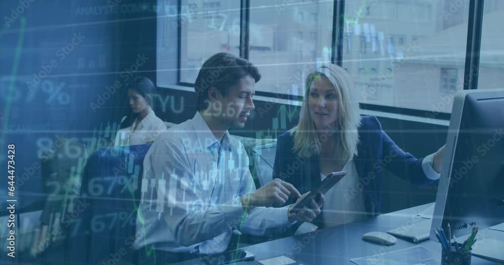 Animation of trading board and graphs over diverse coworkers discussing reports on desktop in office Animation of trading board and graphs over diverse coworkers discussing reports on desktop in office