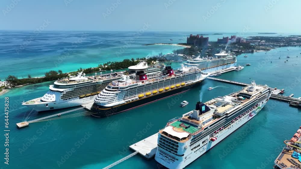 Bahamas - 01 August 2023: Aerial view of cruise ships docked at the port of Nassau on Paradise island along the barrier reef, Bahamas.