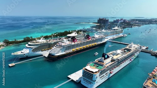 Bahamas - 01 August 2023: Aerial view of cruise ships docked at the port of Nassau on Paradise island along the barrier reef, Bahamas.