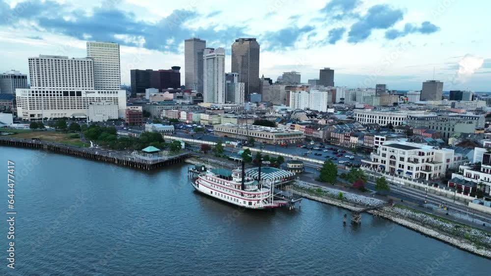 Aerial view of New Orleans skyline at twilight along the Mississippi River, Louisiana, United States. Aerial view of New Orleans skyline at twilight along the Mississippi River, Louisiana, United States.