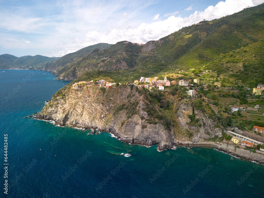 small towns of Italy on the coast, sunny weather, drone photography, warm light, blue sea