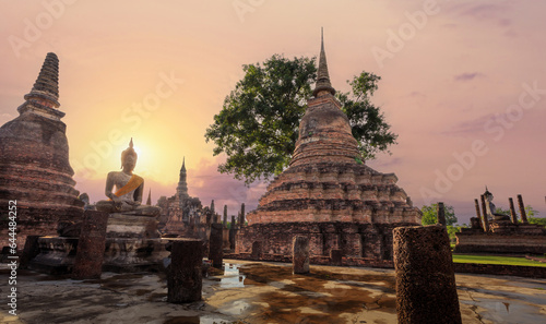 Wat Mahathat  Buddhist temple in Sukhothai historical park. UNESCO and World Heritage Site. Culture and vacation concept. © Amonsak