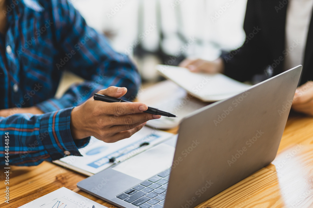 Fototapeta premium Businessman cooperation discussing working analyzing with financial data and marketing growth report graph in team, presentation and brainstorming to strategy planning making profit of company.