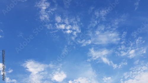 Nature Background. Blue sky and clouds on the morning of a summer working day.