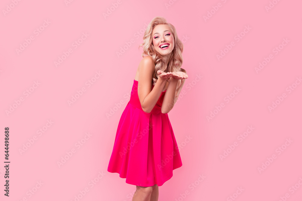 Portrait of excited cute girl beaming smile arms palms hold showing object isolated on pink color background Portrait of excited cute girl beaming smile arms palms hold showing object isolated on pink color background
