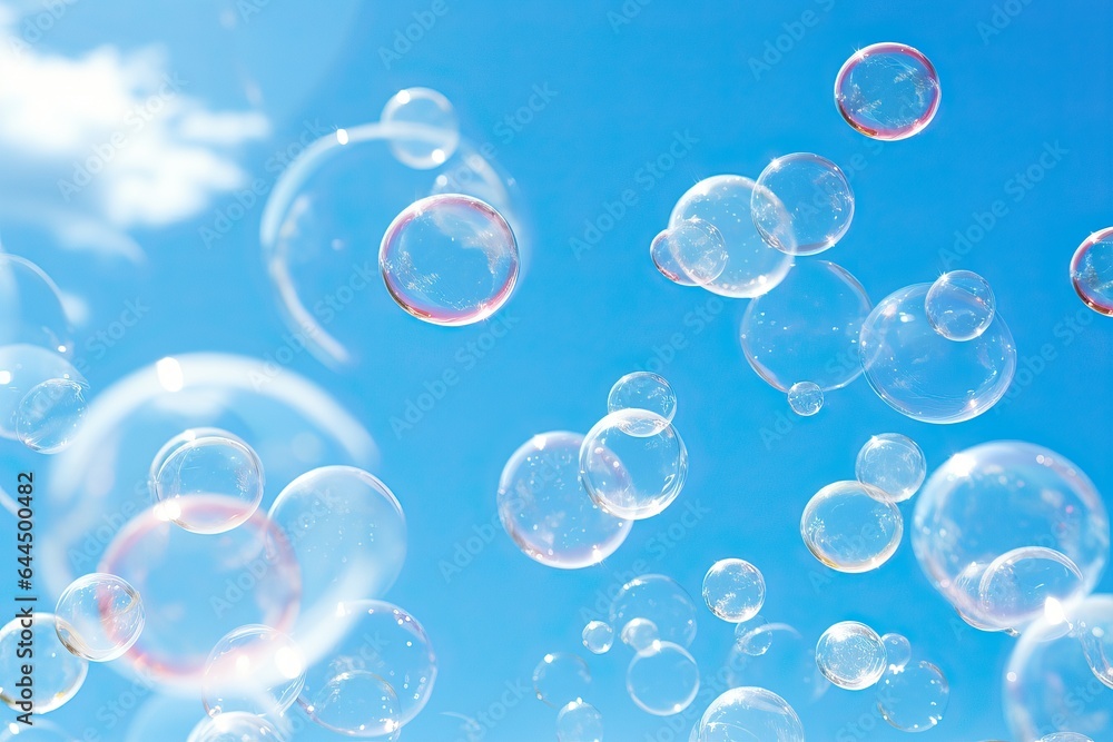 Soap Bubbles with Rainbow Tints against Bright Blue Sky