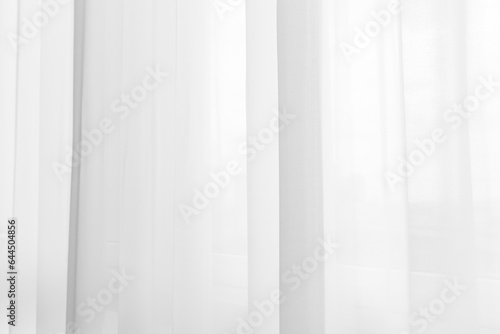Backlit window with white curtains texture