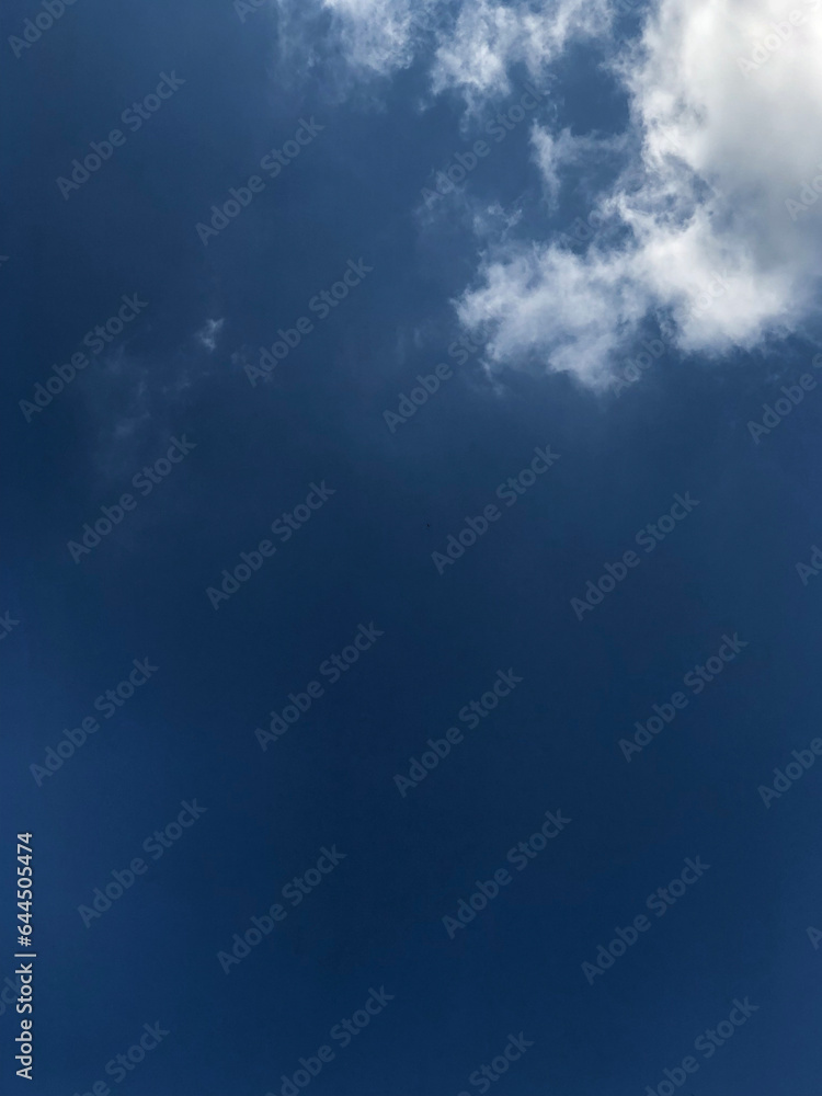 blue sky background with fluffy clouds