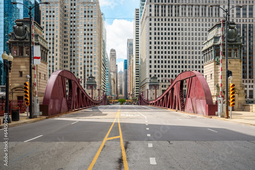 Empty street bridge leading to Chicago loop on a sunny spring morning