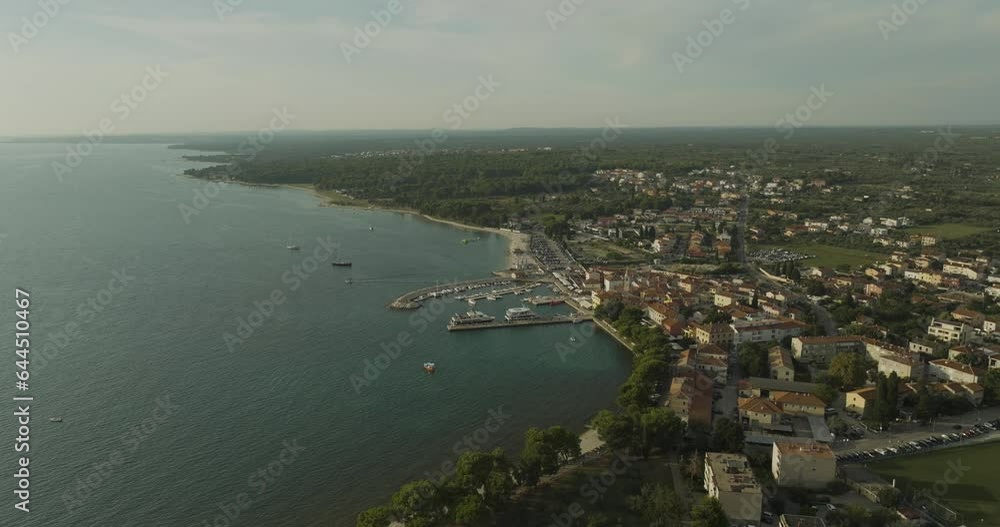 Aerial view of Fazana, a small town with a small harbour along the Adriatic Sea coastline, Istria, Croatia. Aerial view of Fazana, a small town with a small harbour along the Adriatic Sea coastline, Istria, Croatia.
